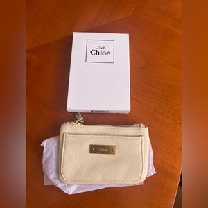 Love Chloe coin pouch.  Brand new